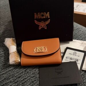 MCM Mode Travia Trifold Chain Wallet
NWT